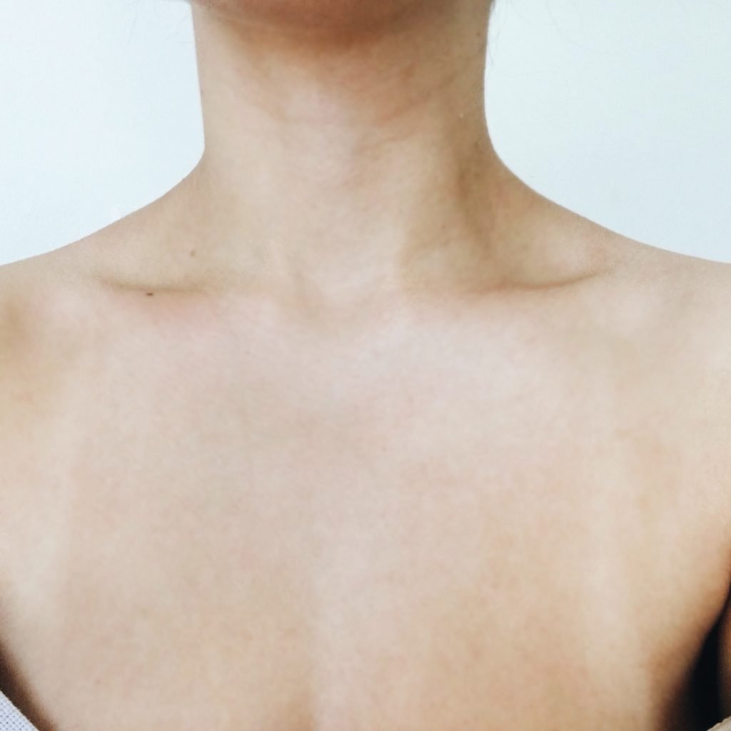 close up womans neck and decolletage